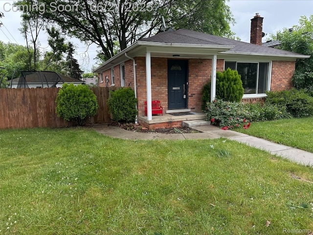 2856 Central St, Berkley, MI 48072 - view of front of house with brick siding, a chimney, and roof with shingles