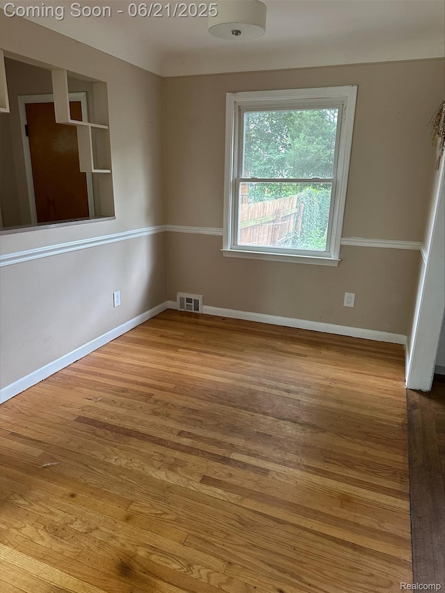 2856 Central St, Berkley, MI 48072 - empty room featuring wood finished floors and baseboards