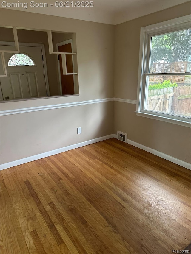 2856 Central St, Berkley, MI 48072 - spare room featuring wood finished floors
