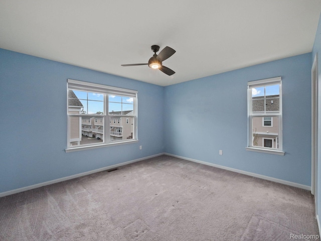 2500 Normandy Rd Unit 41, Royal Oak, MI 48073 - carpeted empty room featuring ceiling fan and baseboards