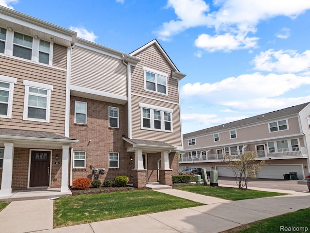 2500 Normandy Rd Unit 41, Royal Oak, MI 48073 - multi unit property featuring brick siding and a front lawn