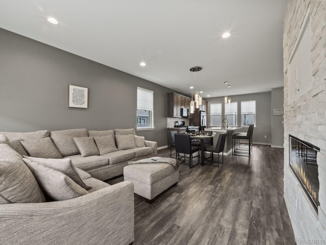 2500 Normandy Rd Unit 41, Royal Oak, MI 48073 - living area featuring recessed lighting, dark wood finished floors, baseboards, and a fireplace