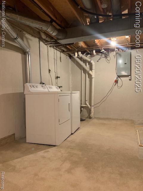 2041 N Arbor Way Dr Unit 71, Canton, MI 48188 - unfinished below grade area featuring electric panel, washer and dryer, and light carpet