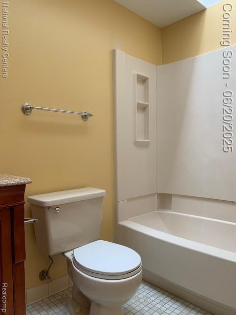 2041 N Arbor Way Dr Unit 71, Canton, MI 48188 - bathroom with vanity, tile patterned floors, and tub / shower combination