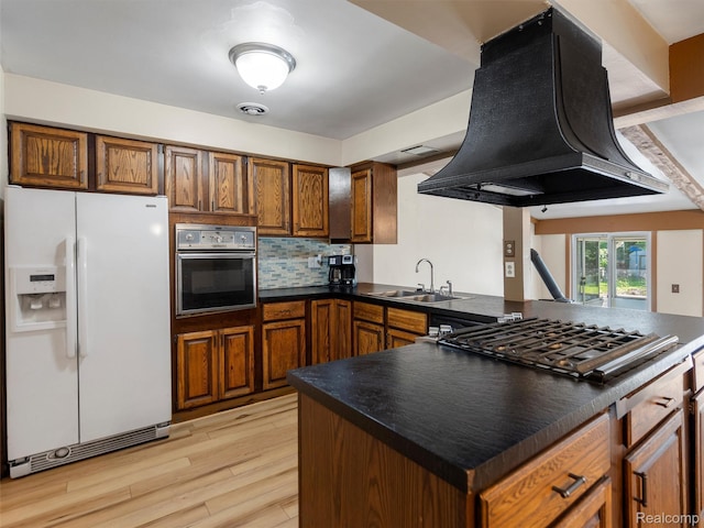 28212 Shock St, Saint Clair Shores, MI 48081 - kitchen featuring white fridge with ice dispenser, black oven, extractor fan, stainless steel gas stovetop, and dark countertops