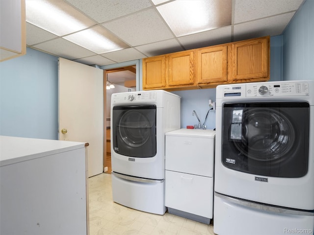 28212 Shock St, Saint Clair Shores, MI 48081 - laundry room featuring washing machine and dryer, cabinet space, and light flooring