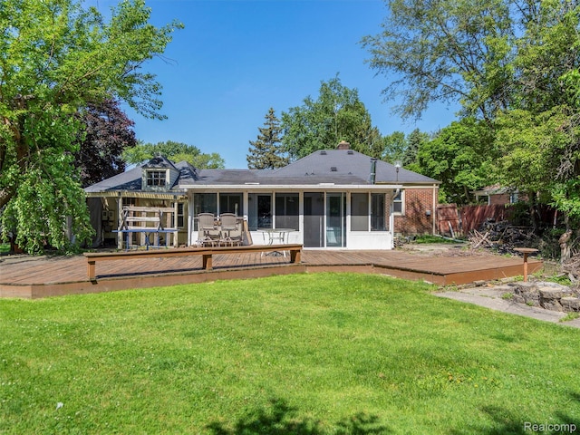 28212 Shock St, Saint Clair Shores, MI 48081 - rear view of house with a sunroom and a wooden deck