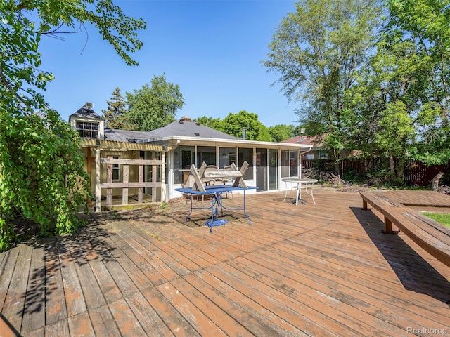 28212 Shock St, Saint Clair Shores, MI 48081 - wooden deck featuring a sunroom