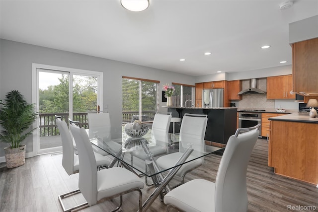 6532 Turtle Walk, Clarkston, MI 48346 - dining space featuring wood finished floors and recessed lighting