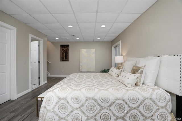 6532 Turtle Walk, Clarkston, MI 48346 - bedroom featuring dark wood finished floors, baseboards, recessed lighting, and a drop ceiling