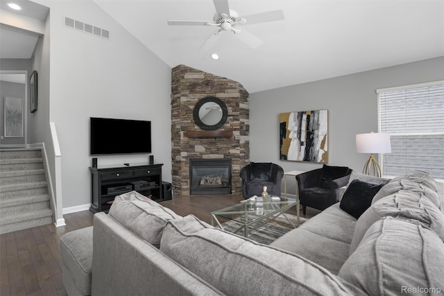 6532 Turtle Walk, Clarkston, MI 48346 - living area with a ceiling fan, lofted ceiling, wood finished floors, stairs, and a fireplace