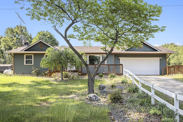 14894 L Dr N, Marshall, MI 49068 - ranch-style home featuring driveway, an attached garage, and a shingled roof