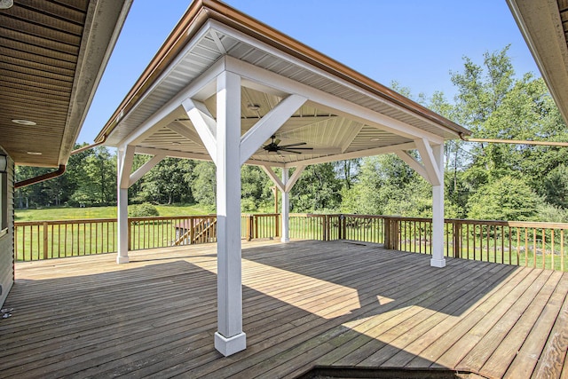 14894 L Dr N, Marshall, MI 49068 - wooden terrace with a ceiling fan and view of wooded area