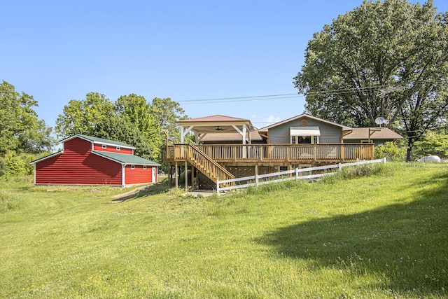 14894 L Dr N, Marshall, MI 49068 - view of green lawn featuring a deck, an outdoor structure, and a barn