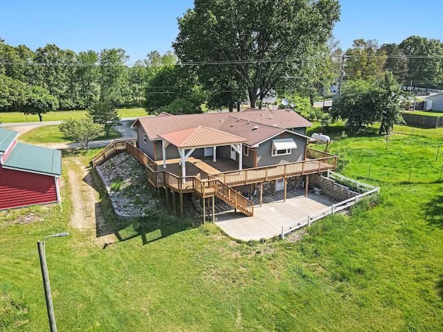 14894 L Dr N, Marshall, MI 49068 - back of property featuring a deck, a patio area, stairway, and a lawn