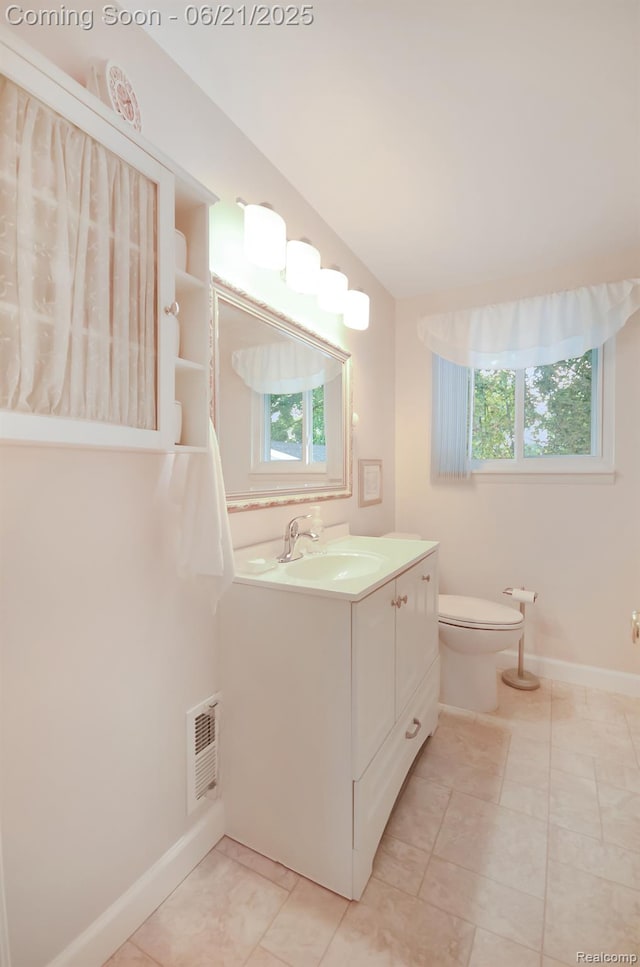 43475 Deborah Dr, Sterling Heights, MI 48313 - bathroom with vanity, healthy amount of natural light, and tile patterned flooring