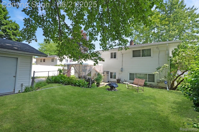 43475 Deborah Dr, Sterling Heights, MI 48313 - back of property featuring a chimney