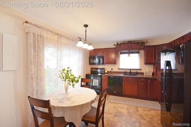 43475 Deborah Dr, Sterling Heights, MI 48313 - kitchen with black appliances, dark countertops, and decorative light fixtures