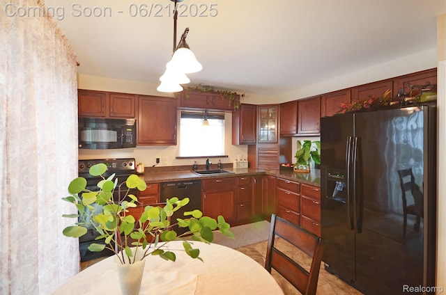 43475 Deborah Dr, Sterling Heights, MI 48313 - kitchen with black appliances, dark countertops, glass insert cabinets, and hanging light fixtures
