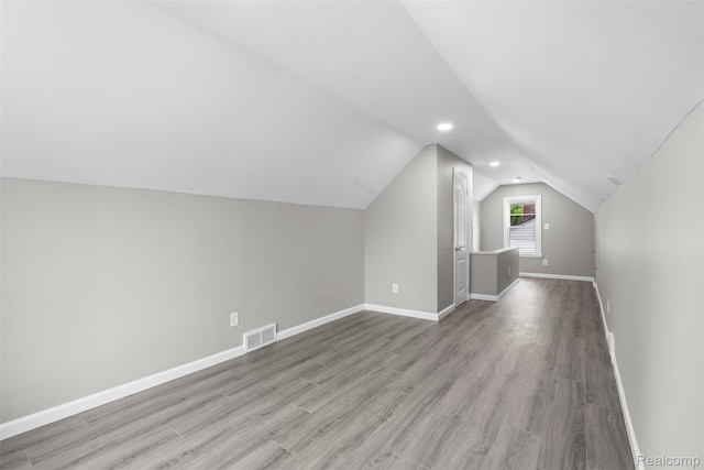 26908 Kitch St, Inkster, MI 48141 - bonus room with lofted ceiling, baseboards, wood finished floors, and recessed lighting