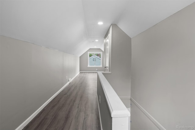 26908 Kitch St, Inkster, MI 48141 - additional living space with vaulted ceiling, dark wood-style floors, baseboards, and recessed lighting