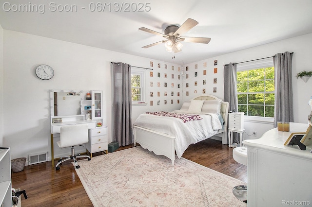 9875 Island Dr, Grosse Ile, MI 48138 - bedroom featuring a desk, dark wood-style floors, and ceiling fan