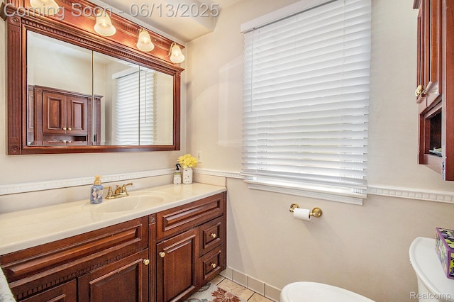 9875 Island Dr, Grosse Ile, MI 48138 - half bath featuring toilet, vanity, and tile patterned floors