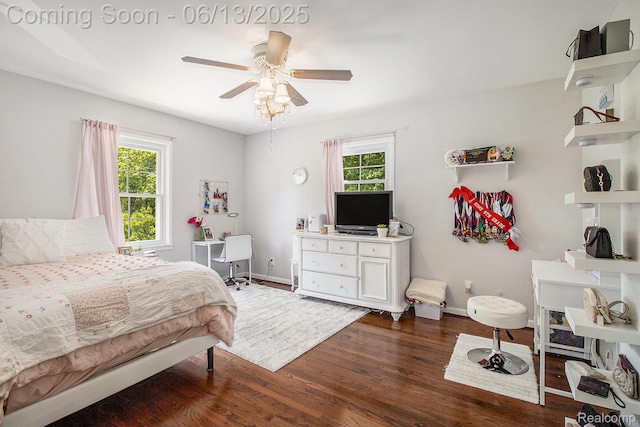 9875 Island Dr, Grosse Ile, MI 48138 - bedroom featuring multiple windows, dark wood finished floors, ceiling fan, and baseboards