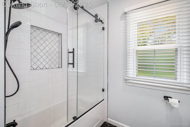 9875 Island Dr, Grosse Ile, MI 48138 - bathroom featuring bath / shower combo with glass door and baseboards