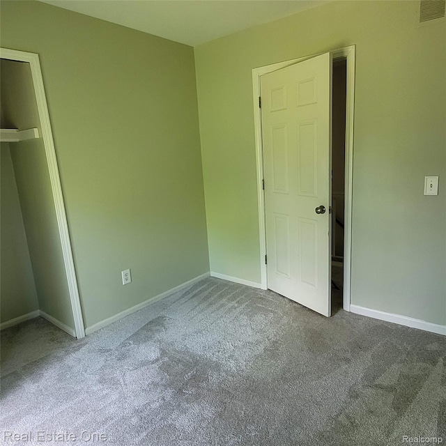 5208 Woodview Dr, Bloomfield Hills, MI 48302 - unfurnished bedroom with carpet floors and baseboards