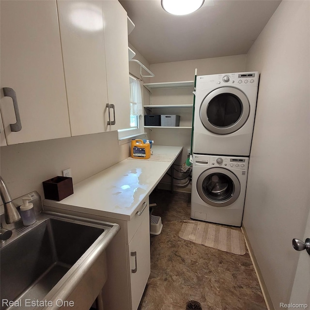 5208 Woodview Dr, Bloomfield Hills, MI 48302 - washroom with stacked washer and clothes dryer and cabinet space