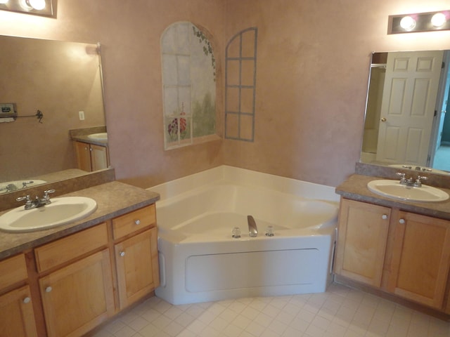2856 Barclay Way, Ann Arbor, MI 48105 - bathroom featuring a bath, tile patterned floors, and two vanities