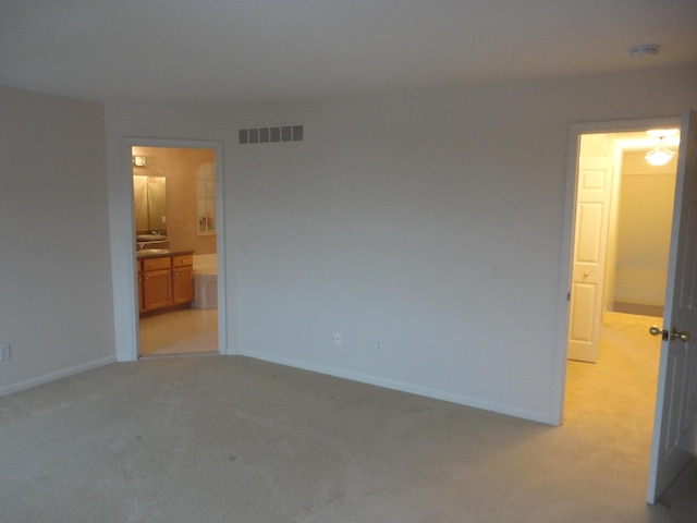 2856 Barclay Way, Ann Arbor, MI 48105 - spare room with light colored carpet, baseboards, and a smoke detector