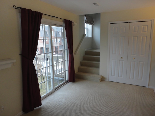 2856 Barclay Way, Ann Arbor, MI 48105 - basement featuring carpet flooring, stairs, and baseboards