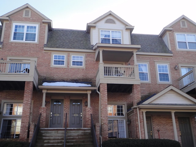 2856 Barclay Way, Ann Arbor, MI 48105 - view of property with a balcony and brick siding