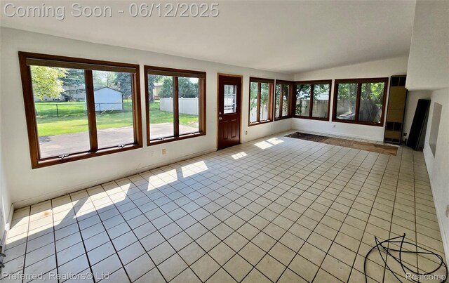 9498 Bassett St, Livonia, MI 48150 - unfurnished sunroom with vaulted ceiling