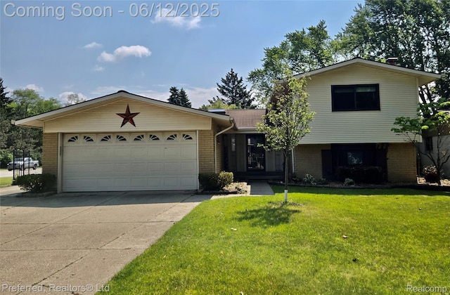 9498 Bassett St, Livonia, MI 48150 - tri-level home featuring brick siding, a front yard, concrete driveway, and a garage