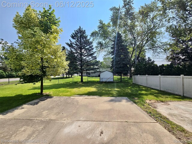 9498 Bassett St, Livonia, MI 48150 - view of yard featuring a patio area