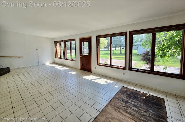 9498 Bassett St, Livonia, MI 48150 - unfurnished living room featuring light tile patterned floors