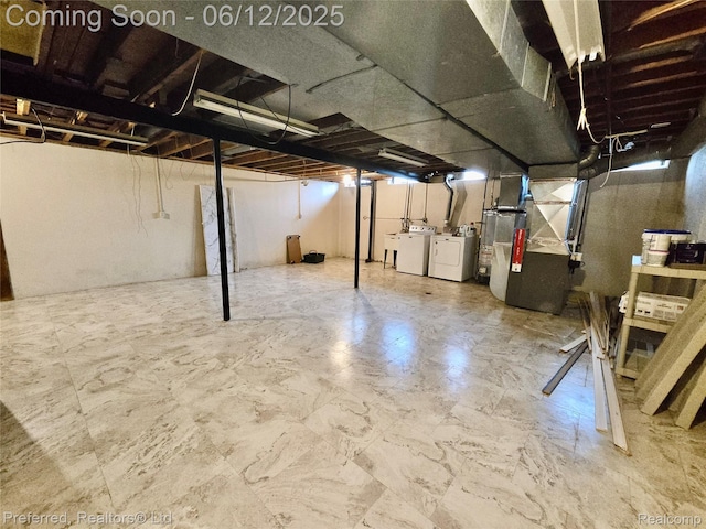 9498 Bassett St, Livonia, MI 48150 - unfinished basement featuring washer and dryer and heating unit