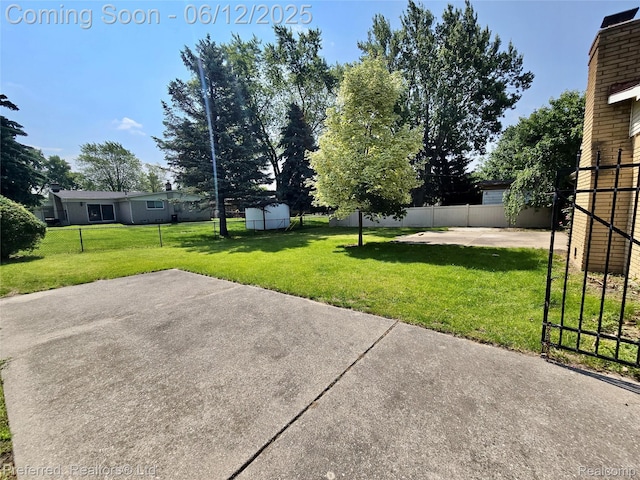 9498 Bassett St, Livonia, MI 48150 - view of yard featuring a patio