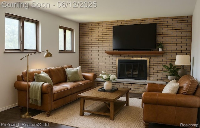 9498 Bassett St, Livonia, MI 48150 - living room featuring wood finished floors and a fireplace