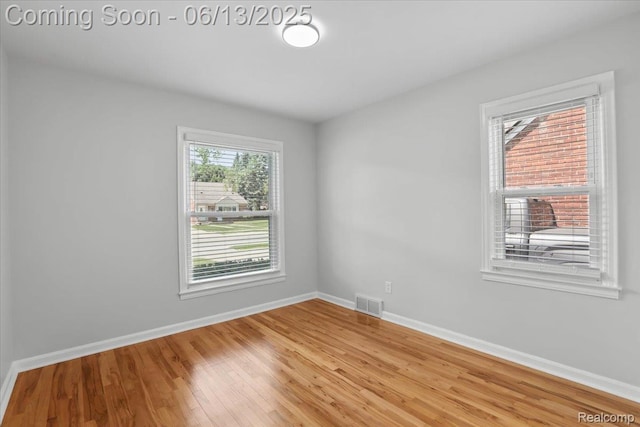 1630 N Denwood St, Dearborn, MI 48128 - empty room with baseboards and light wood-style flooring