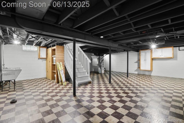 1630 N Denwood St, Dearborn, MI 48128 - below grade area featuring tile patterned floors, stairway, and heating unit
