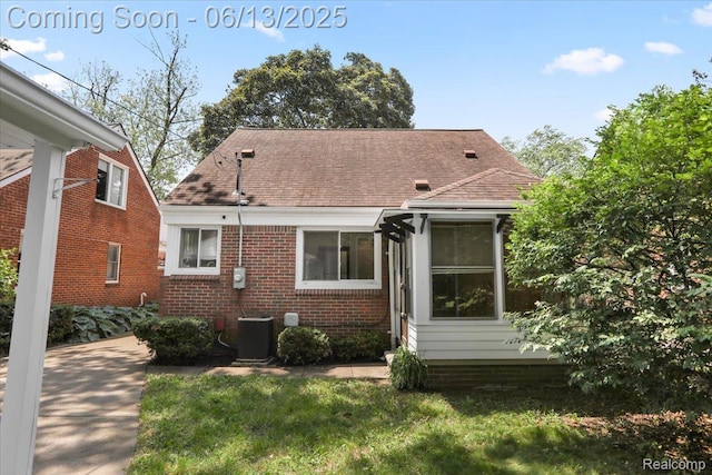 1630 N Denwood St, Dearborn, MI 48128 - rear view of property with brick siding and a shingled roof