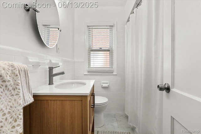 1630 N Denwood St, Dearborn, MI 48128 - full bathroom with marble finish flooring, tile walls, vanity, a wainscoted wall, and a shower with shower curtain