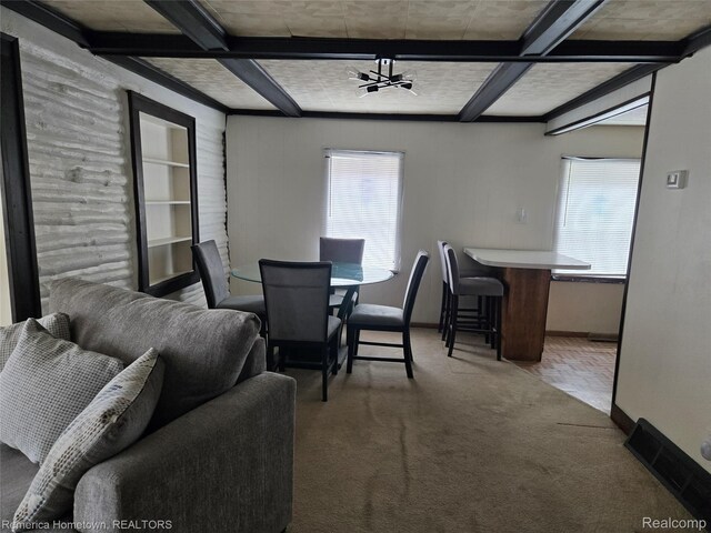 8991 Lakeview Dr, White Lake, MI 48386 - carpeted dining space with coffered ceiling and beamed ceiling