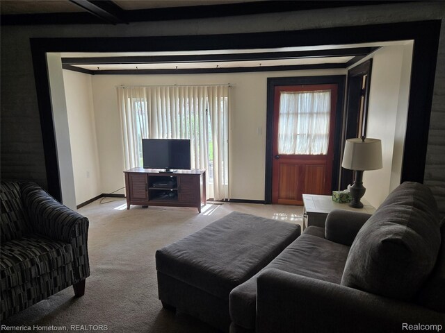 8991 Lakeview Dr, White Lake, MI 48386 - living room featuring light carpet, plenty of natural light, and beamed ceiling