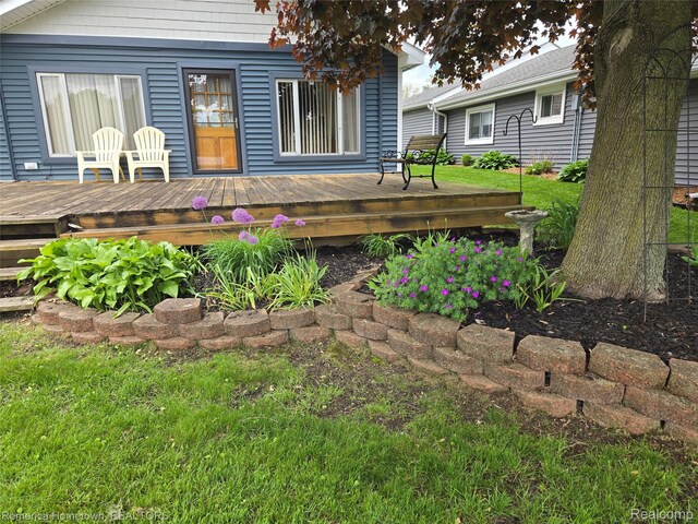 8991 Lakeview Dr, White Lake, MI 48386 - back of property with a wooden deck