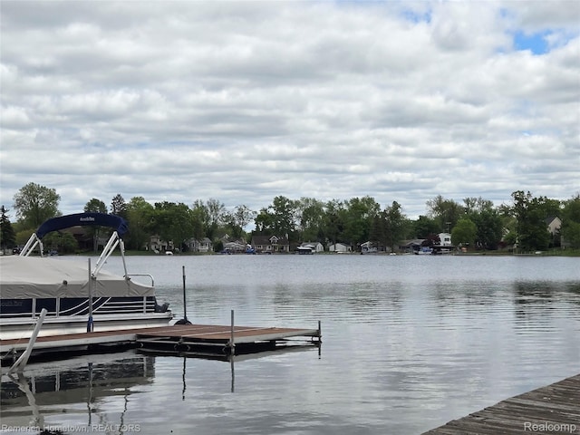 8991 Lakeview Dr, White Lake, MI 48386 - dock featuring a water view
